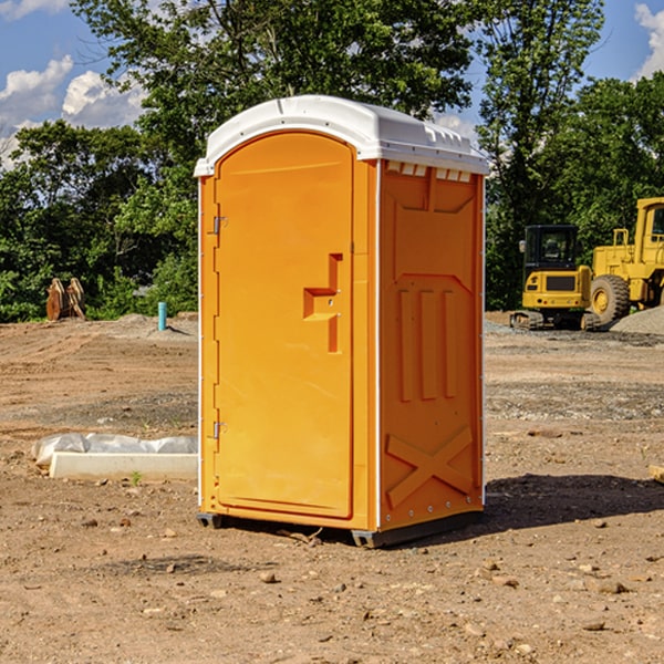 how often are the portable toilets cleaned and serviced during a rental period in Macon County